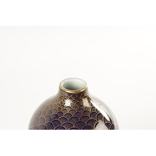 124 - A LATE 19TH CENTURY JAPANESE PORCELAIN DOUBLE GOURD CABINET VASE with entwined dragon decoration on ... 