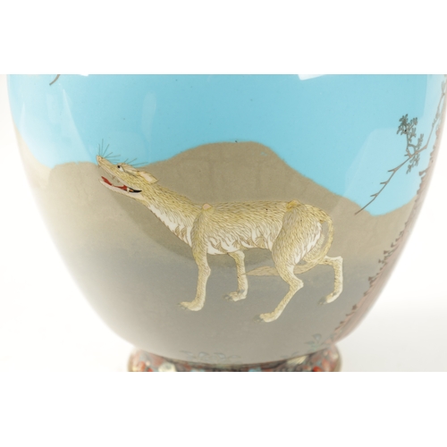 125 - AN UNUSUAL AND RARE JAPANESE MEIJI PERIOD CLOISONNE ENAMELLED VASE decorated with a standing wolf in... 