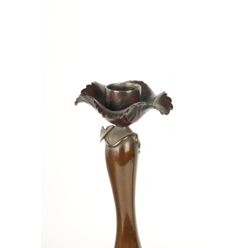 139 - A FINE PAIR OF JAPANESE MEIJI PATINATED BRONZE FIGURAL CANDLESTICKS the plain slender ovoid vase sha... 