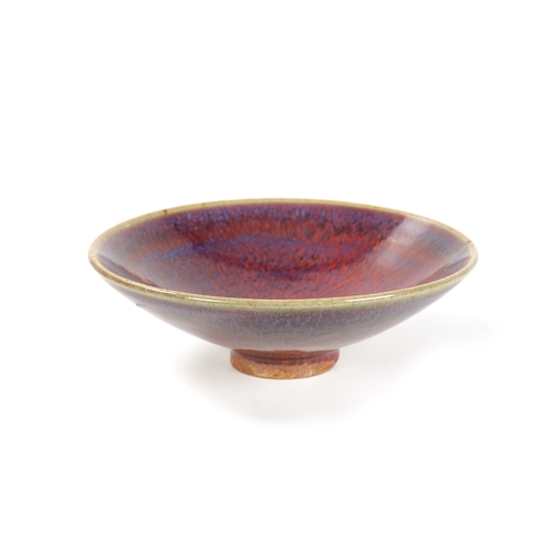 149 - A CHINESE SAND DE BOEUF FLAMBE GLAZED FLARED RIM BOWL (18.5cm diameter)