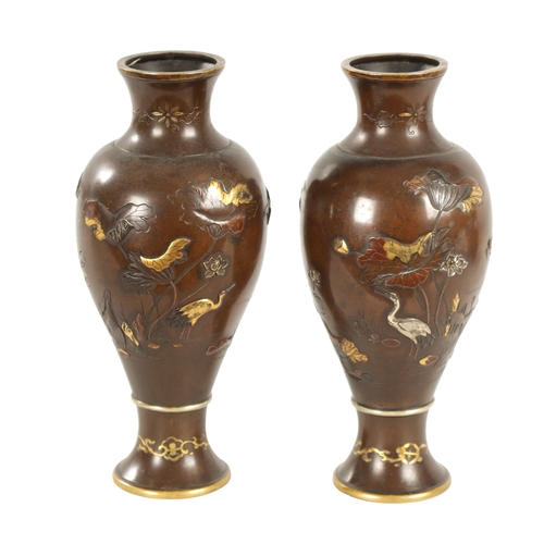 165 - A PAIR OF JAPANESE MEIJI PERIOD MIXED METAL BRONZE VASES finely decorated with birds amongst flowers... 