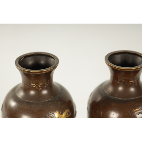 165 - A PAIR OF JAPANESE MEIJI PERIOD MIXED METAL BRONZE VASES finely decorated with birds amongst flowers... 