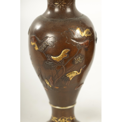 165 - A PAIR OF JAPANESE MEIJI PERIOD MIXED METAL BRONZE VASES finely decorated with birds amongst flowers... 