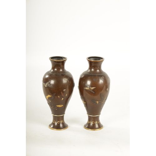 165 - A PAIR OF JAPANESE MEIJI PERIOD MIXED METAL BRONZE VASES finely decorated with birds amongst flowers... 