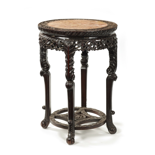 167 - AN OVERSIZED 19TH CENTURY CHINESE CARVED HARDWOOD CENTRE TABLE /VASE STAND the circular top with scr... 