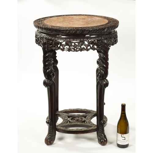 167 - AN OVERSIZED 19TH CENTURY CHINESE CARVED HARDWOOD CENTRE TABLE /VASE STAND the circular top with scr... 