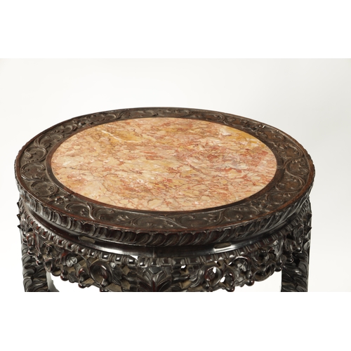 167 - AN OVERSIZED 19TH CENTURY CHINESE CARVED HARDWOOD CENTRE TABLE /VASE STAND the circular top with scr... 