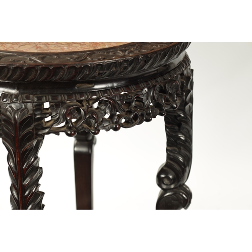 167 - AN OVERSIZED 19TH CENTURY CHINESE CARVED HARDWOOD CENTRE TABLE /VASE STAND the circular top with scr... 