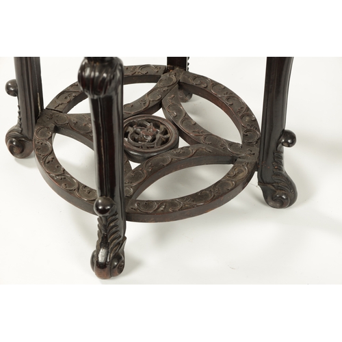 167 - AN OVERSIZED 19TH CENTURY CHINESE CARVED HARDWOOD CENTRE TABLE /VASE STAND the circular top with scr... 