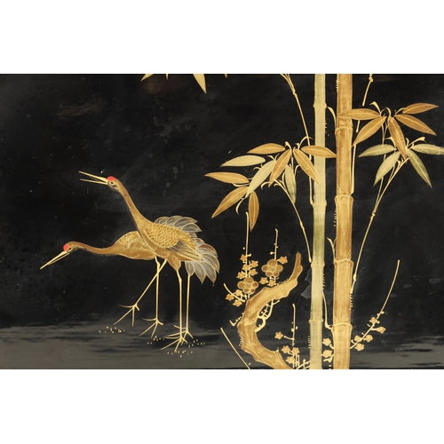 169 - A LATE 19TH CENTURY JAPANESE LACQUERWORK TRAY with gilt work decoration depicting two cranes under b... 