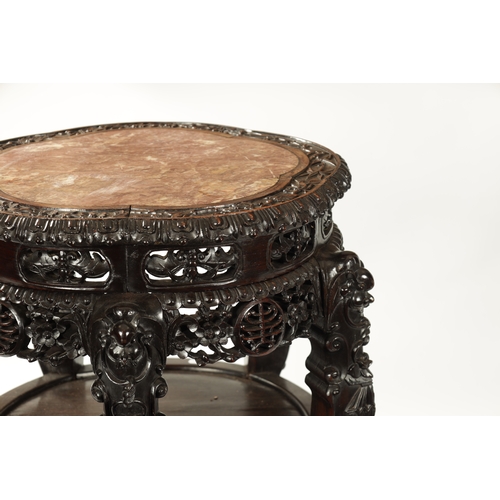 176 - AN OVERSIZED 19TH CENTURY CHINESE FINELY CARVED CENTRE TABLE /VASE STAND the slightly scalloped top ... 