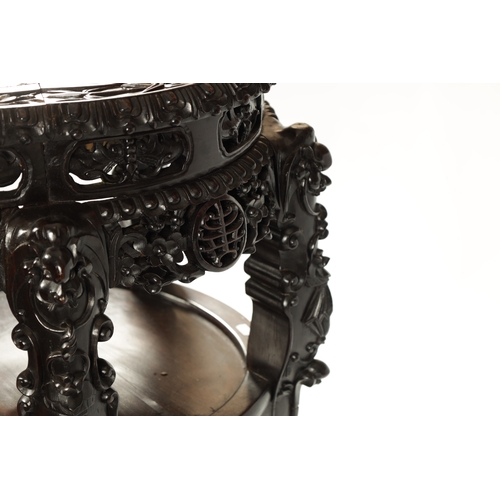 176 - AN OVERSIZED 19TH CENTURY CHINESE FINELY CARVED CENTRE TABLE /VASE STAND the slightly scalloped top ... 