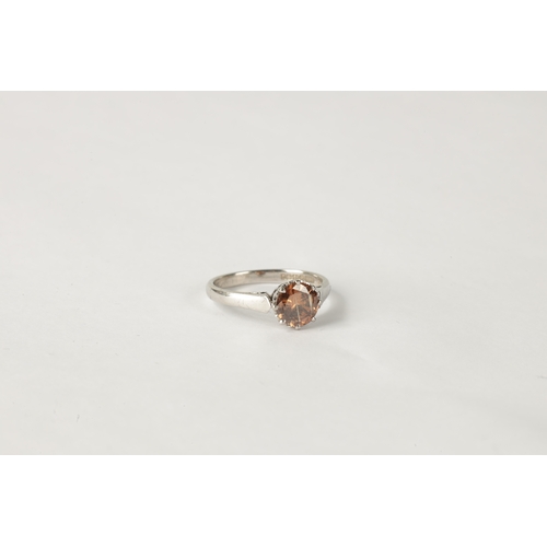 183 - A 1.14ct BRILLIANT CUT COGNAC AND 18CT WHITE GOLD SOLITAIRE RING, with crown setting and plain shank... 