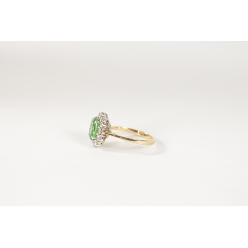 190 - AN 18CT.750 HALLMARKED YELLOW GOLD CLUSTER SET PERIDOT AND DIAMOND DRESS RING the centre oval facete... 