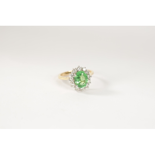 190 - AN 18CT.750 HALLMARKED YELLOW GOLD CLUSTER SET PERIDOT AND DIAMOND DRESS RING the centre oval facete... 