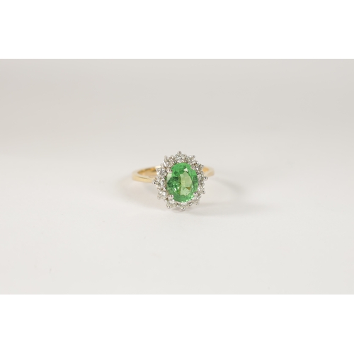 190 - AN 18CT.750 HALLMARKED YELLOW GOLD CLUSTER SET PERIDOT AND DIAMOND DRESS RING the centre oval facete... 