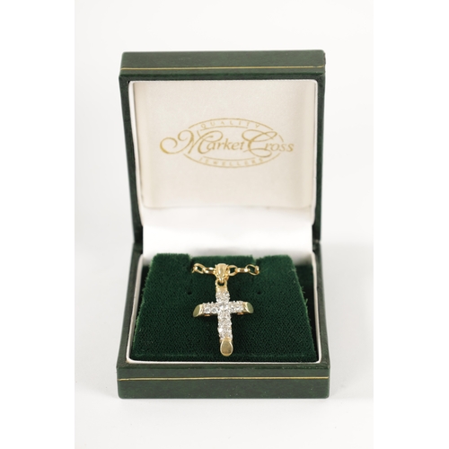 192 - A 9CT YELLOW GOLD AND DIAMOND ENCRUSTED PENDANT NECKLACE with canted cross setting on an oval open l... 