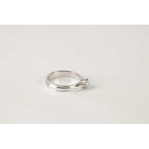 198 - A 0.31CT DIAMOND AND 18CT WHITE GOLD SOLITAIRE RING with a ribbon-shaped band, SI2 clarity (AnchorCe... 