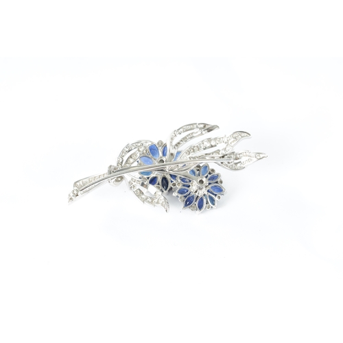 206 - A FINE MID 20TH CENTURY PLATINUM SAPPHIRE AND DIAMOND FLOWER SPRAY BROOCH the flower heads set with ... 