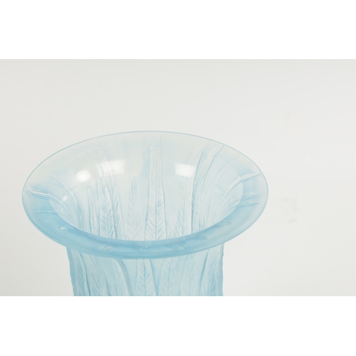 22 - A RENE LALIQUE OPALESCENT AND BLUE STAINED 'EUCALYPTUS' FLARED NECK GLASS VASE with all-round moulde... 