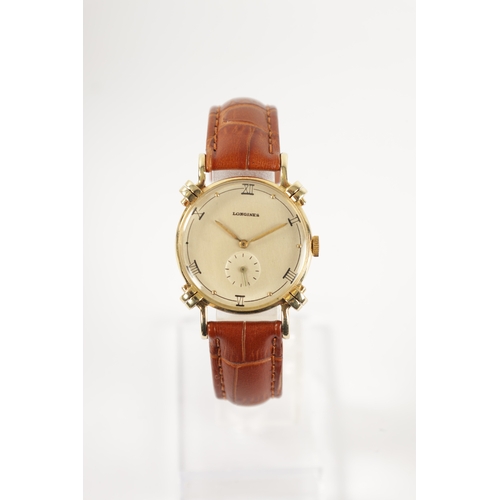 224 - A VINTAGE 14CT GOLD LONGINES WRISTWATCH with champagne dial and spasmodic Roman chapter ring enclosi... 