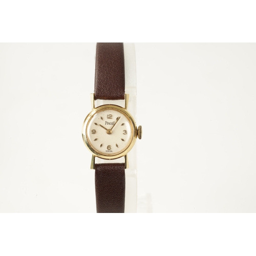 227 - A VINTAGE 18CT GOLD LADIES PIAGET WRISTWATCH with manual wind movement on a later leather strap. (17... 