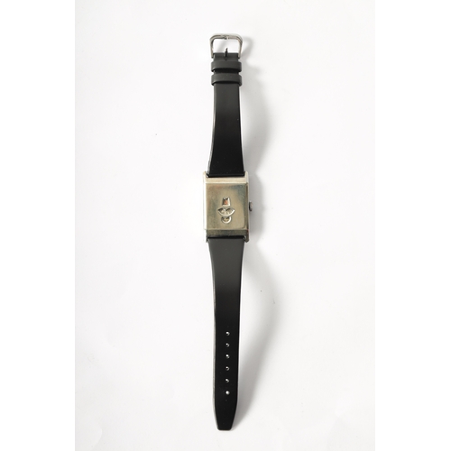 231 - A GENTLEMEN’S 1930’S NICKEL CASED JUMP HOUR WRISTWATCH on black leather strap, the rectangular case ... 