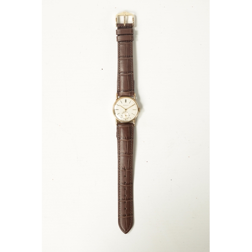 259 - A GENTLEMAN’S 9CT GOLD MOVADO WRISTWATCH with gold buckle and later crocodile leather strap. The gol... 