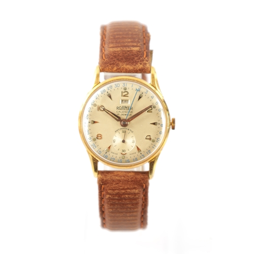 262 - A VINTAGE ROAMER CALENDAR GOLD PLATED WRISTWATCH having a silvered dial with gilt Arabic numerals an... 