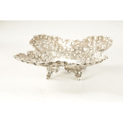 277 - A LATE 19TH CENTURY SILVER SWEAT-MEAT DISH with leaf work and shell decoration by Martin Hall & Co. ... 