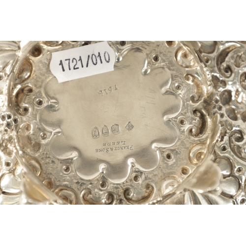 277 - A LATE 19TH CENTURY SILVER SWEAT-MEAT DISH with leaf work and shell decoration by Martin Hall & Co. ... 