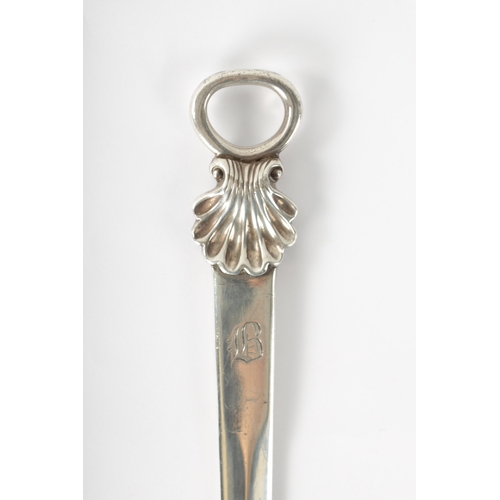 279 - A LATE GEORGIAN SILVER LETTER OPENER with shell moulded top London, dated 1811, 128cm high (32.5cm o... 