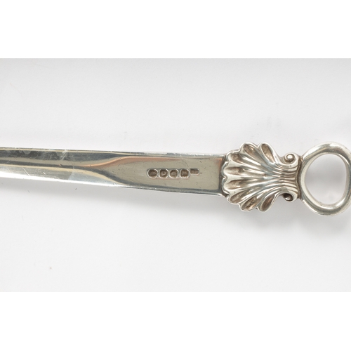 279 - A LATE GEORGIAN SILVER LETTER OPENER with shell moulded top London, dated 1811, 128cm high (32.5cm o... 