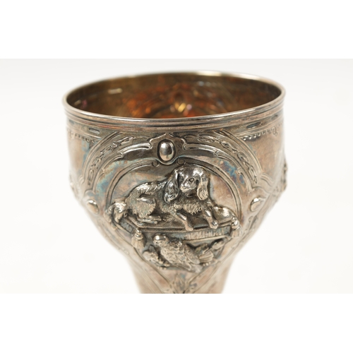 291 - A VICTORIAN SILVER AND SILVER GILT GOBLET embossed to the body with Queen Victoria's pets, Dash the ... 