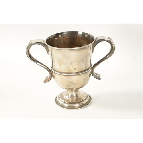 293 - A GEORGE III SILVER LOVING CUP the plain two-handled urn shaped body with engraved monogram, girdled... 