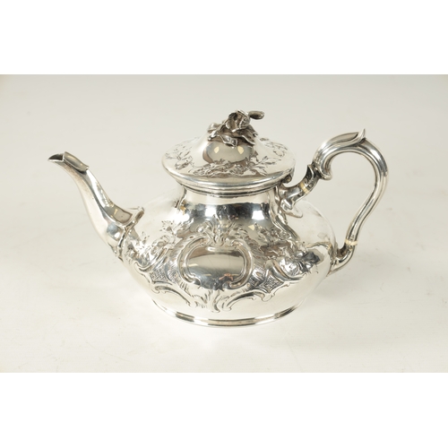 294 - A LATE REGENCY SILVER TEAPOT decorated with rococo style leafwork scrolls and rose finial with bone ... 