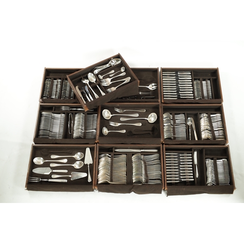 297 - A LARGE EARLY 20TH CENTURY 24SERVING FRENCH CHRISTOFLE SILVER PLATED CUTLERY SET in two fitted oak b... 