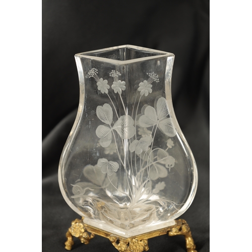 30 - A PAIR OF 19TH CENTURY FRENCH ROCK CRYSTAL ORMOLU MOUNTED VASES with etched leaf work and floral des... 