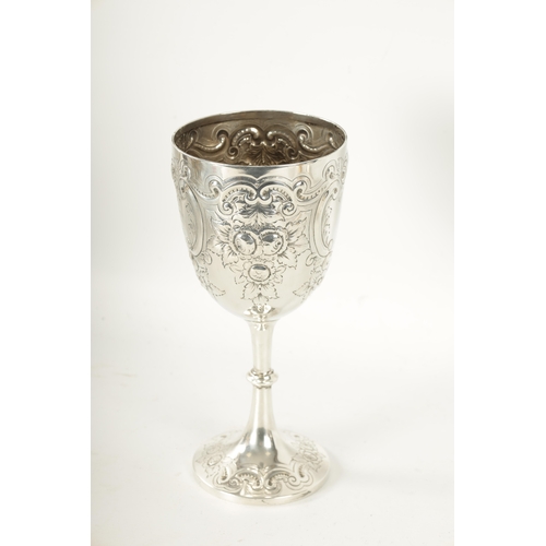 300 - A LATE 19TH CENTURY SILVER GOBLET having embossed decoration with inscription dated 1897 by James De... 