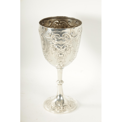 300 - A LATE 19TH CENTURY SILVER GOBLET having embossed decoration with inscription dated 1897 by James De... 