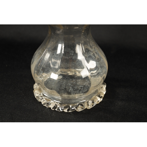 301 - A LATE 19TH CENTURY SILVER MOUNTED GLASS DECANTER of shaped form with crimped edge and silver neck w... 