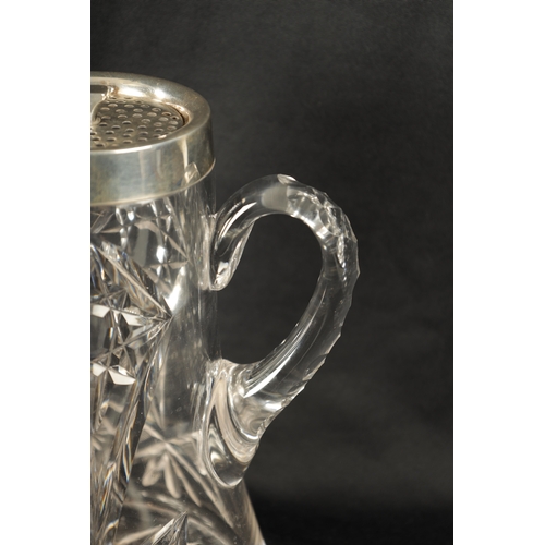 309 - AN EARLY 20TH CENTURY CUT GLASS AND SILVER MOUNTED LEMONADE JUG of tapering form with twist of peirc... 