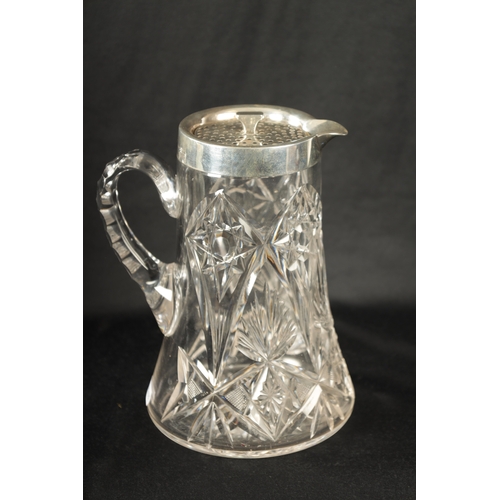 309 - AN EARLY 20TH CENTURY CUT GLASS AND SILVER MOUNTED LEMONADE JUG of tapering form with twist of peirc... 