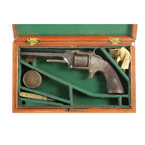 313 - A RIMFIRE SMITH AND WESSON SIX SHOT REVOLVER with hinged octagonal barrel signed on the top flat 'A.... 