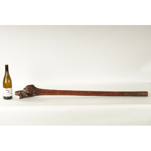 314 - A 19TH CENTURY FIJIAN ROOTWOOD WAR CLUB with panelled chip carved wrigglework handle. (115cm overall... 