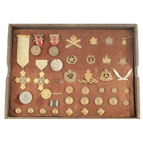 316 - A LARGE COLLECTION OF MILITARY MEDALS AND HAT BADGES displayed on three velvet lined trays