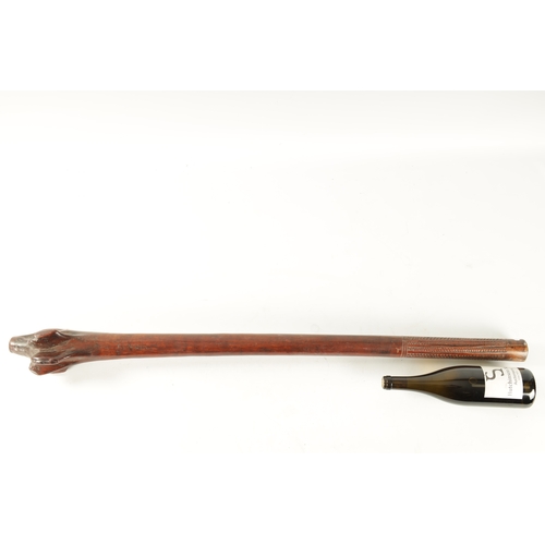 317 - A GOOD 19TH CENTURY FIJIAN ROOT WOOD FIGHTING CLUB with swiggle work carved handle. (107cm overall)