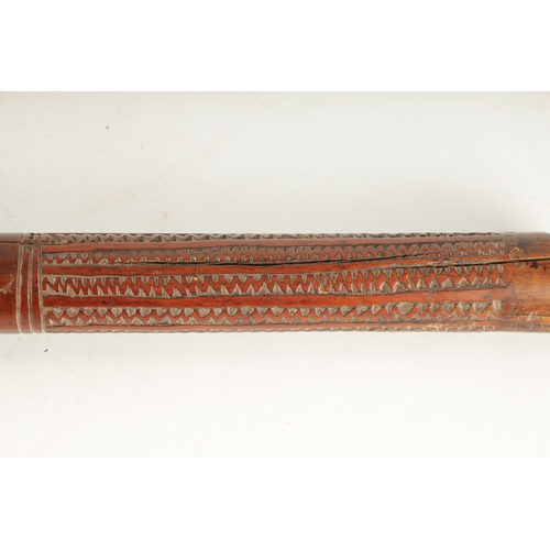 317 - A GOOD 19TH CENTURY FIJIAN ROOT WOOD FIGHTING CLUB with swiggle work carved handle. (107cm overall)