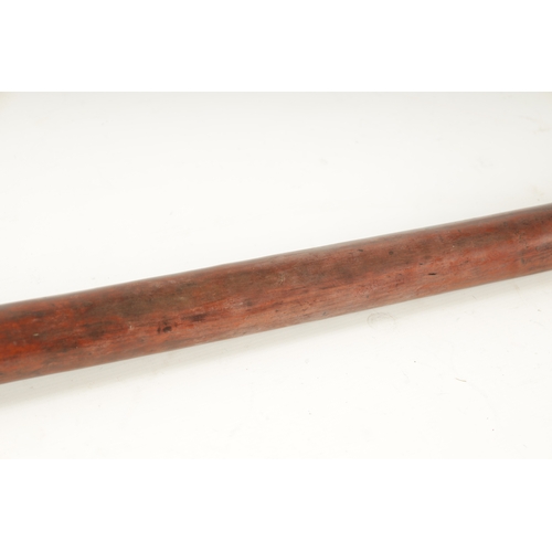 317 - A GOOD 19TH CENTURY FIJIAN ROOT WOOD FIGHTING CLUB with swiggle work carved handle. (107cm overall)