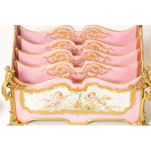 32 - A 19TH CENTURY FRENCH SERVES STYLE PORCELAIN AND ORMOLU MOUNTED DESK SET comprising of a letter rack... 